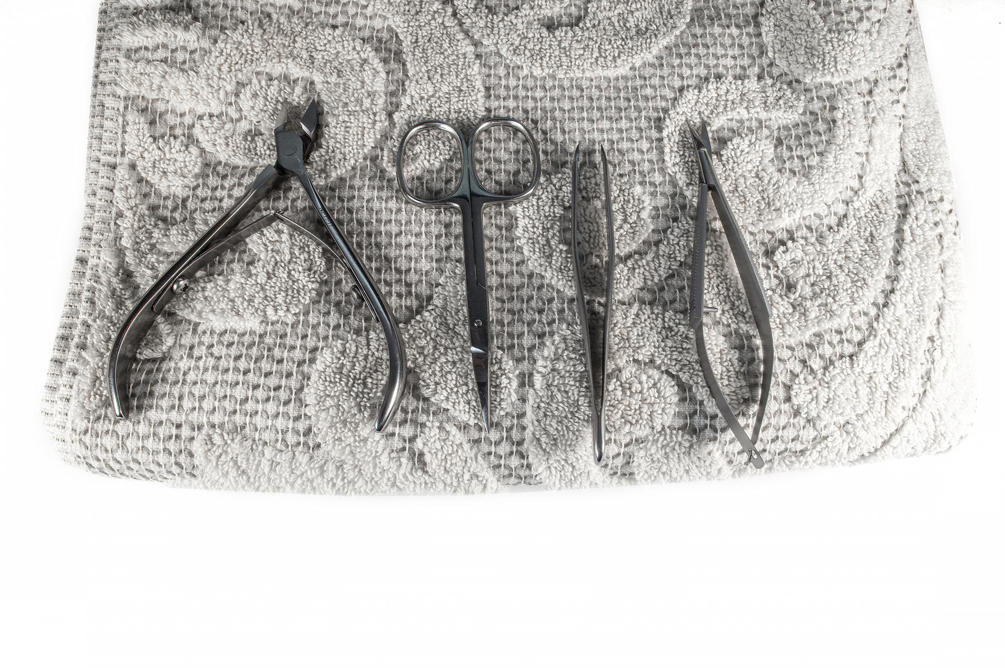 artisan stitching a linen sampler